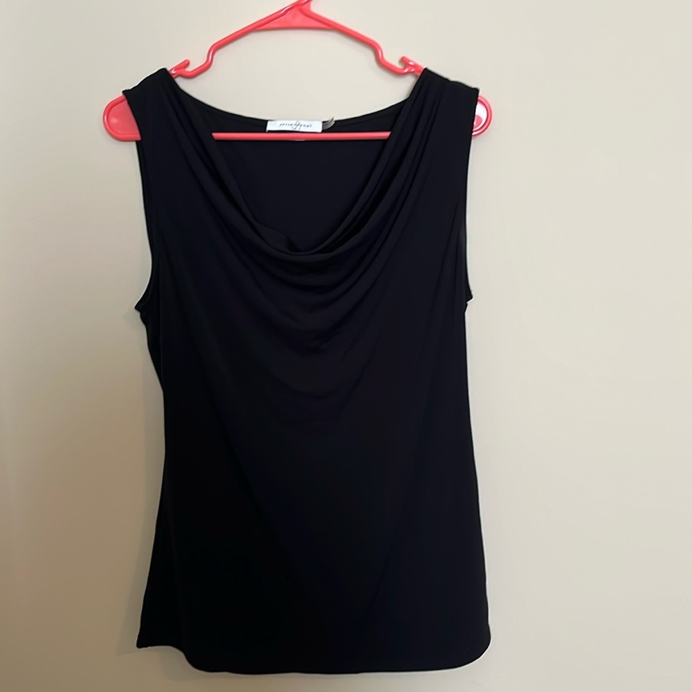 Black top goes with everything! Made in Philippines.